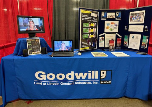 LLGI Career booth set up at job fair.