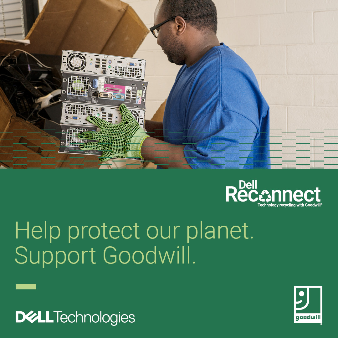 Man holding old computer to be recycled by Dell Reconnect.
